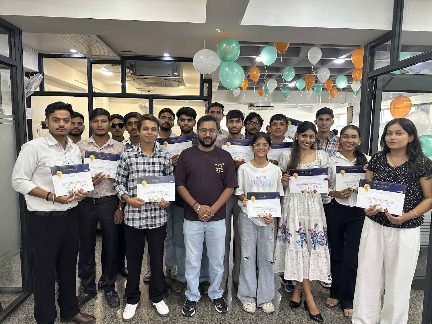Briwon Academy learners proudly holding course certificates